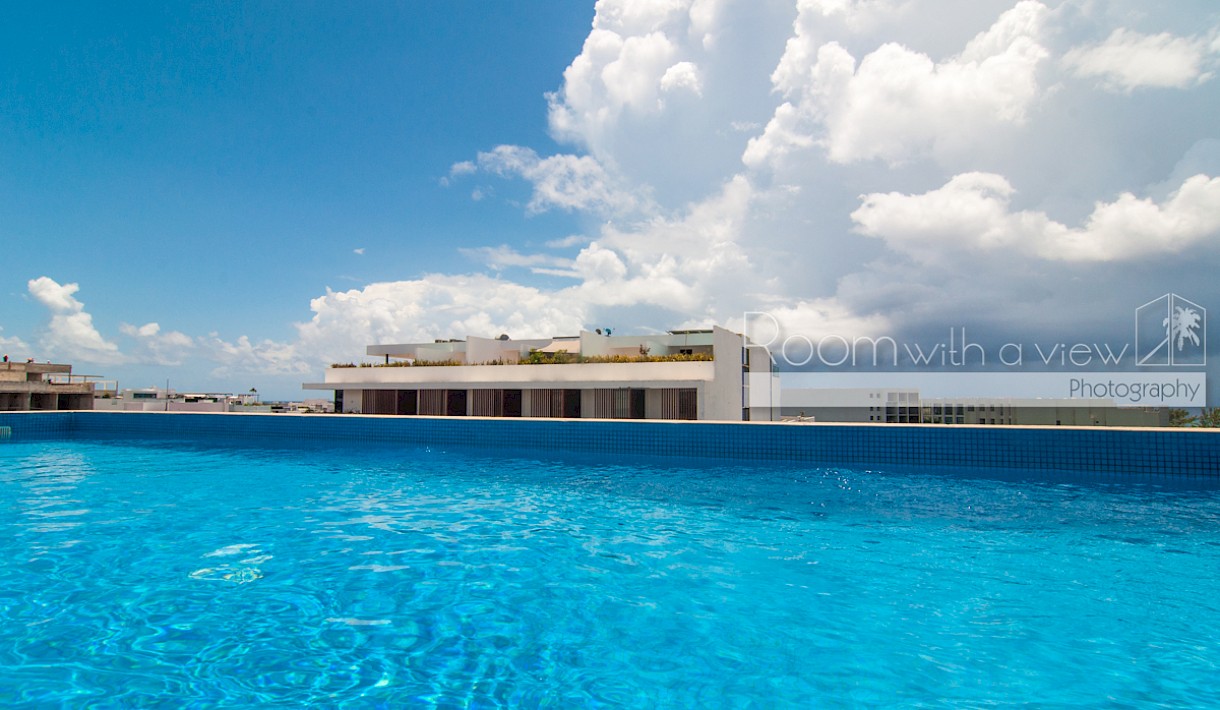 Playa Del Carmen Real Estate Listing | Quinta Coral Suites Beach Time